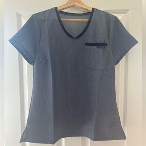 JAANUU Women's 2-Pocket Tuck-In Scrub Top - Sz M in Heather Navy